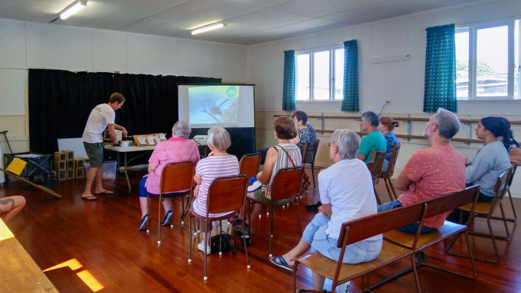 Dai from Tiakina presents to a group of Kamo locals at a workshop